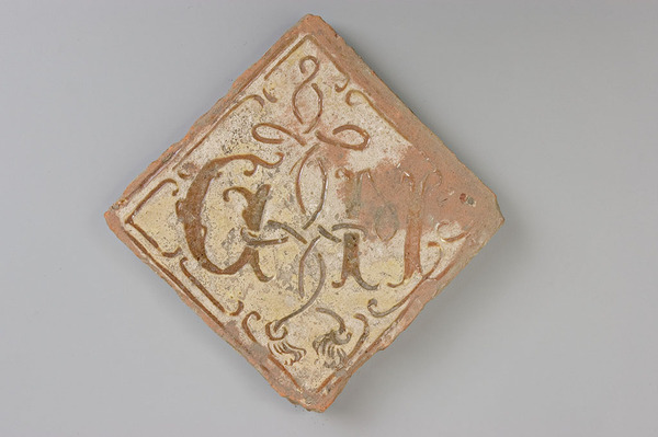 Floor tiles with depiction of a love ribbon