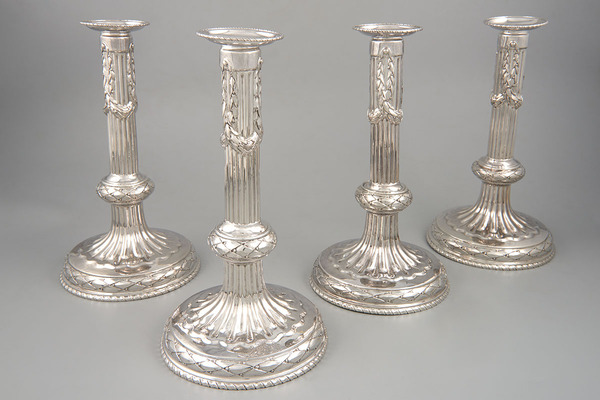 Four silver table candelabrums in Louis XVI style