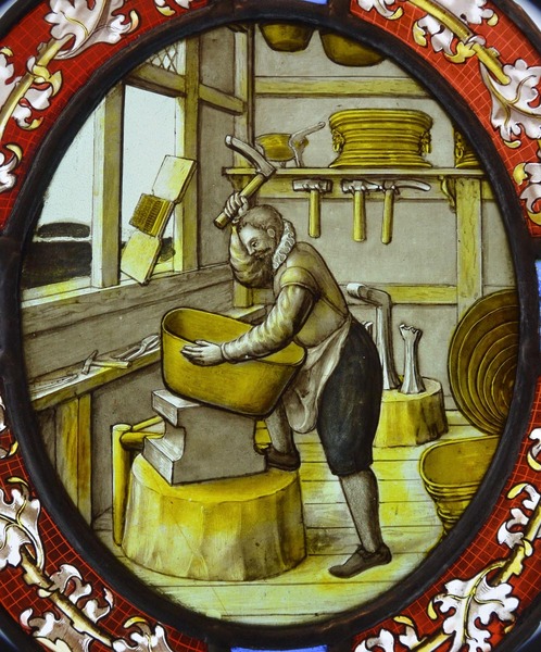 Coppersmith in his workplace
